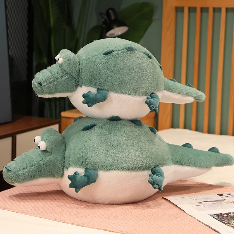 Size comparison of the plush crocodiles.