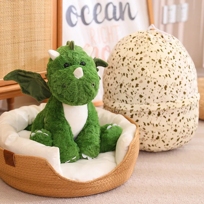 Soft plush dragon egg with removable dragon sat next to the egg. 