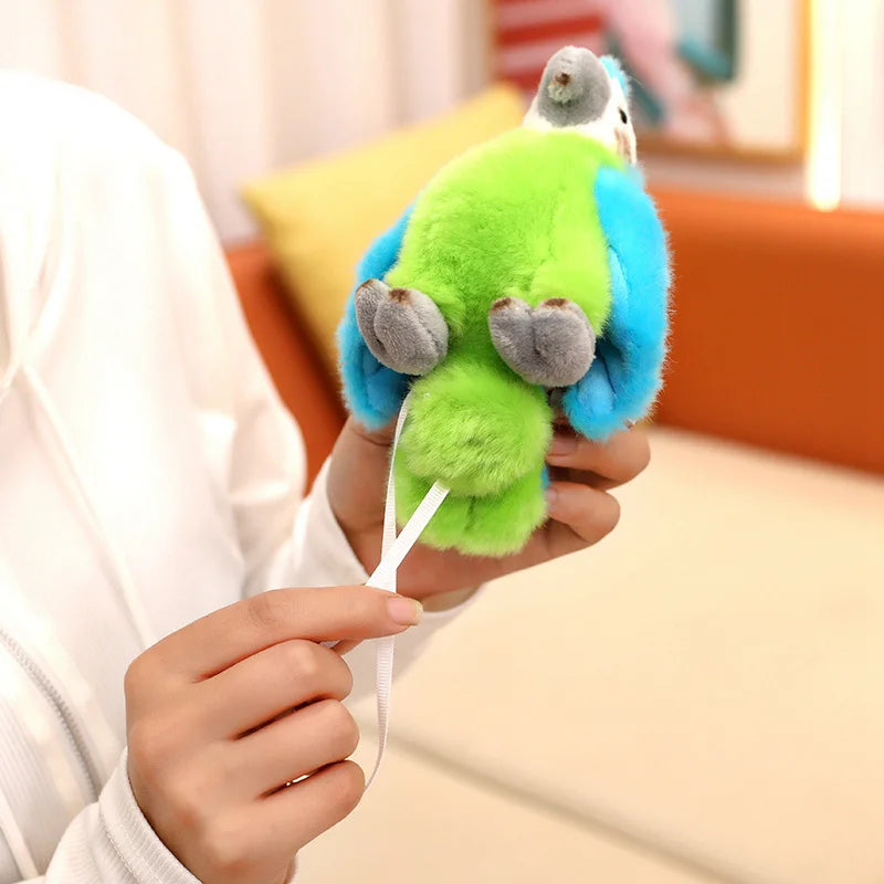 Colorful plush parrot toy held by a person in a casual setting.