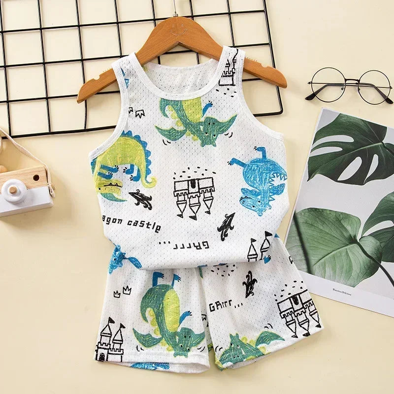Children's sleeveless top and shorts pyjama set with dinosaur prints on a hanger.