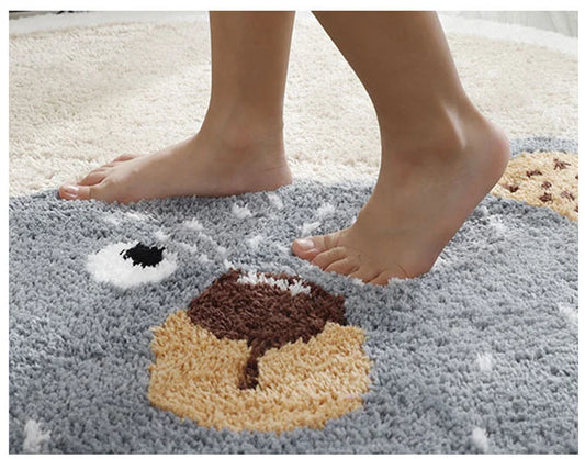 Person stepping onto a textured rug with a bear print design.