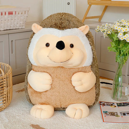 Plush hedgehog toy on a carpeted floor with a vase of flowers and a basket in the background.