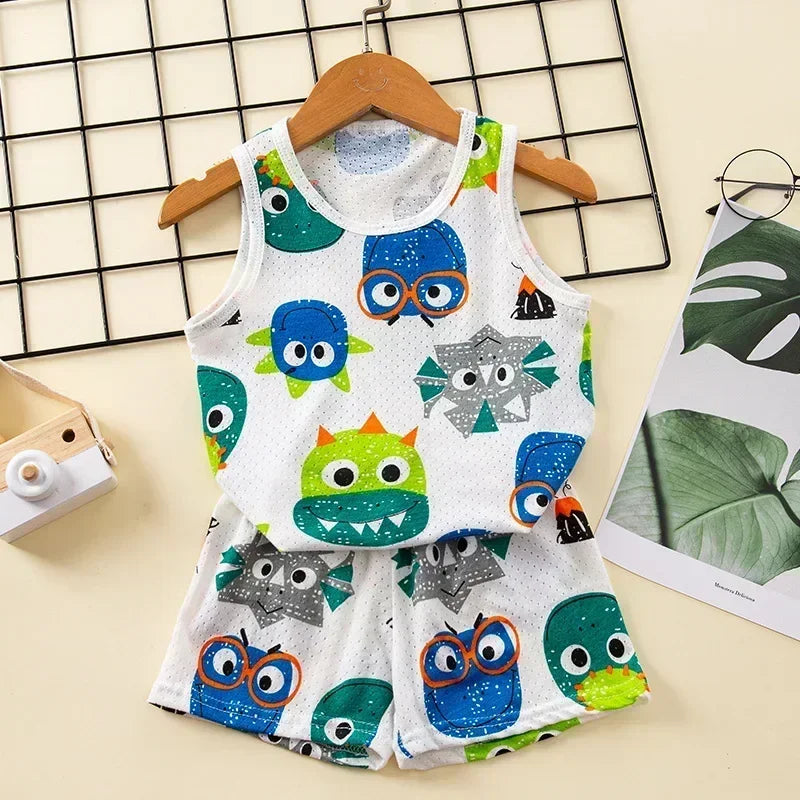 Children's sleeveless shirt and shorts pyjama set with dinosaur pattern on a hanger against a grid background