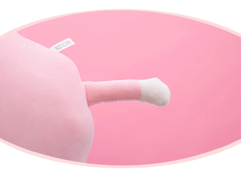 Close up detail of the leg of a pink plush cloud toy.