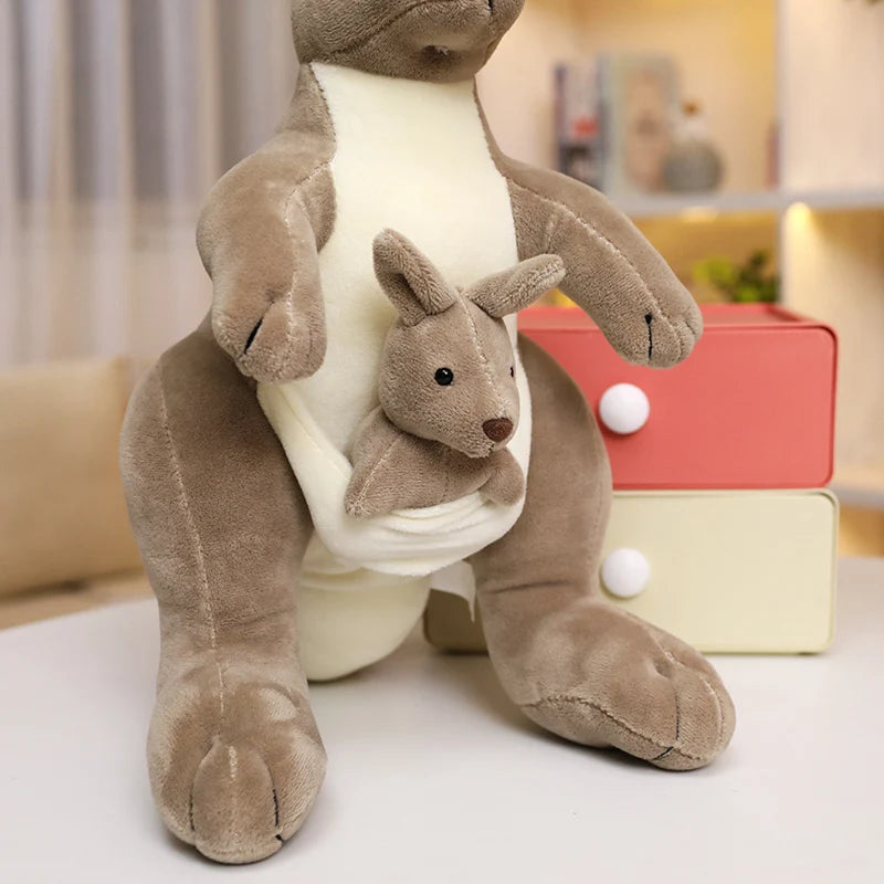 Large kangaroo soft toy with joey in pouch, featuring a soft grey-brown plush finish and white belly