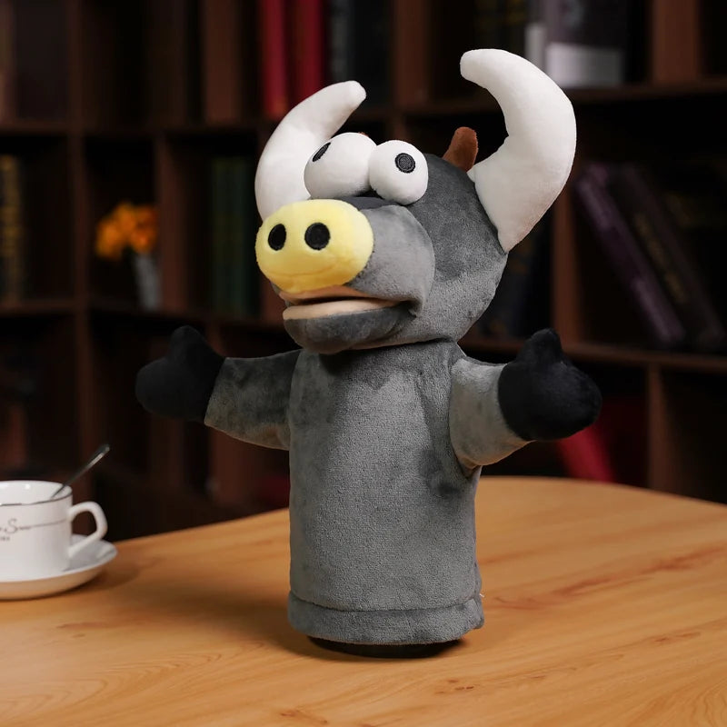 Puppet resembling a cartoon bull with horns on a wooden table