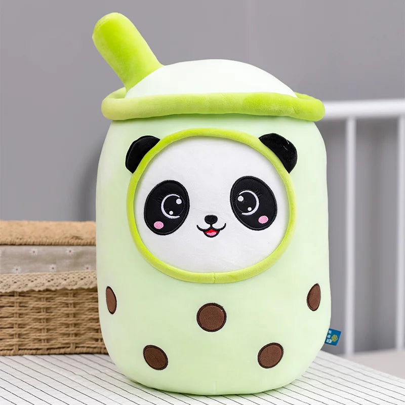Panda bubble tea plush toy in pastel green with cute panda character design on a neutral background. 
