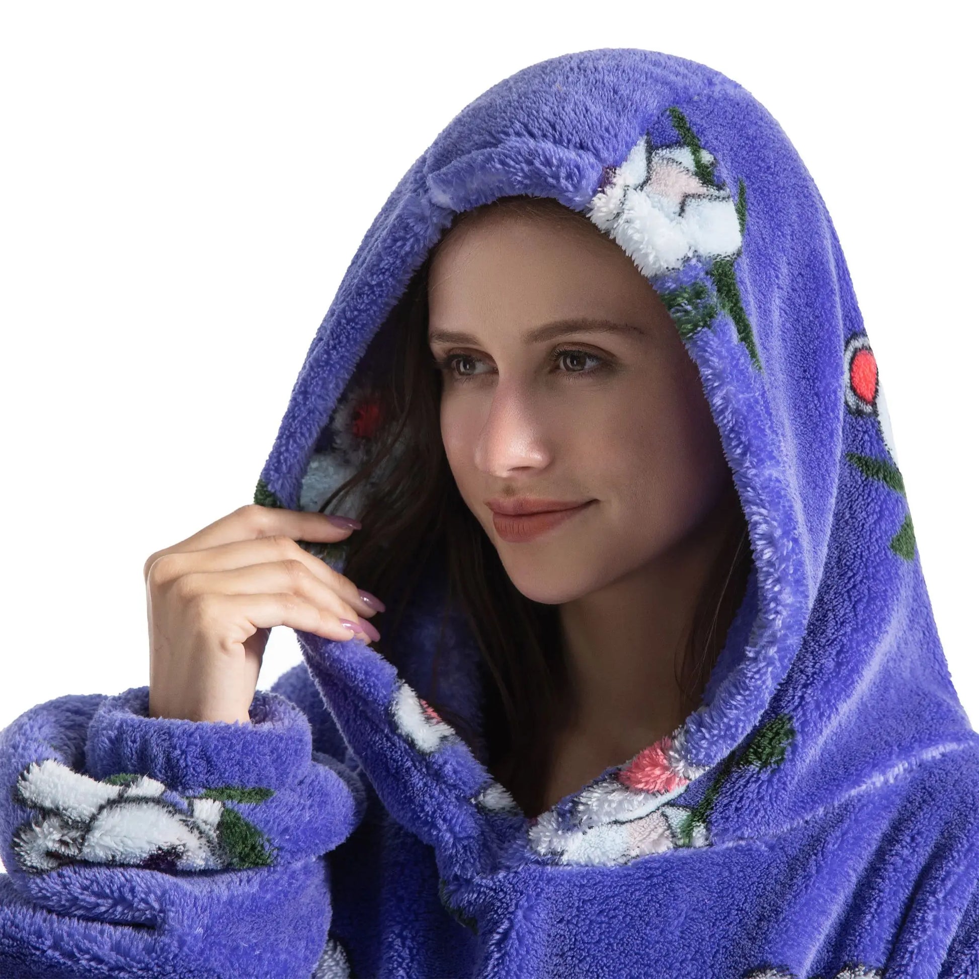 Woman wearing a purple robe with koala patterns on a white background