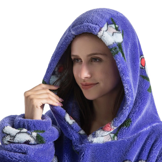Woman wearing a purple robe with koala patterns on a white background