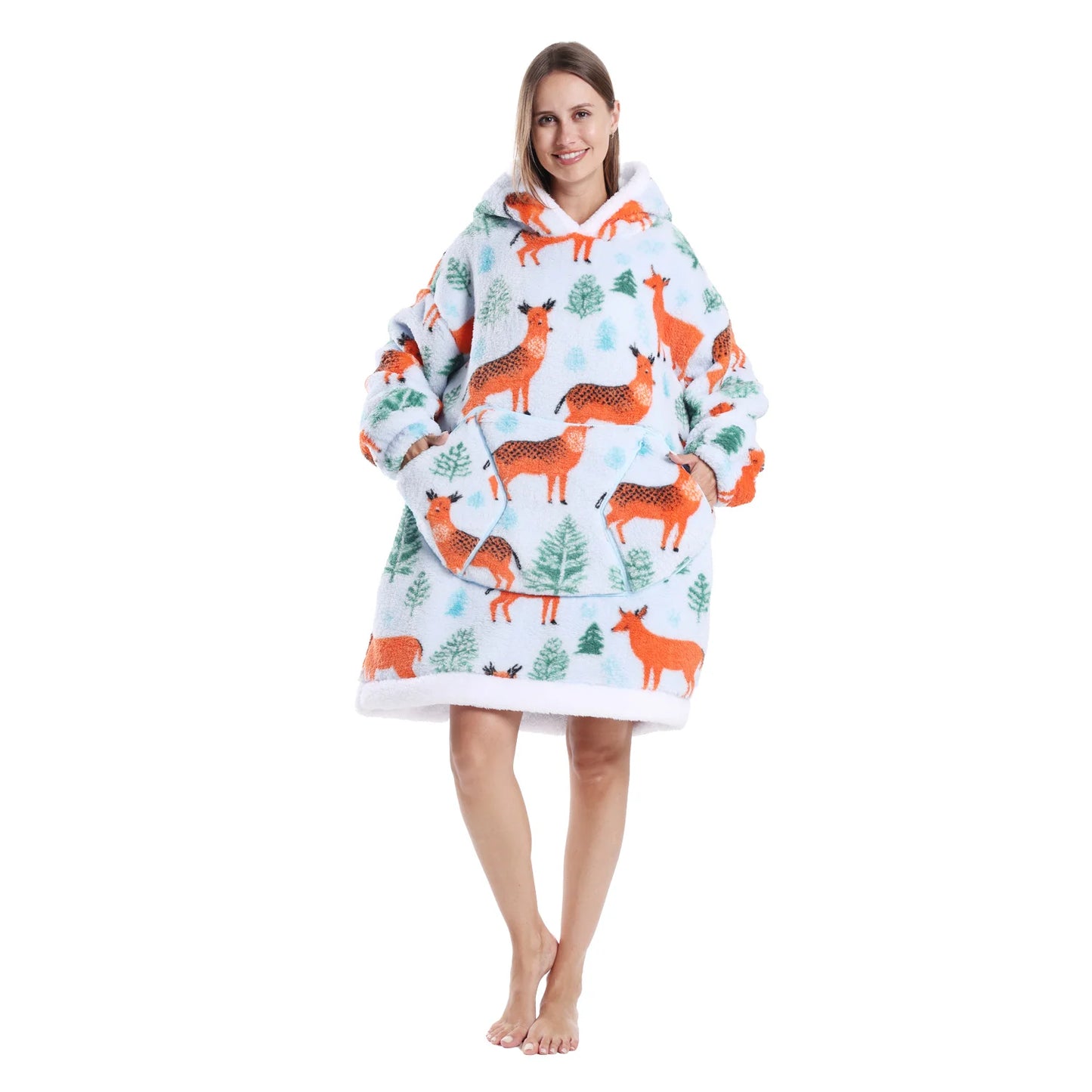 Woman wearing a oversized Christmas themed hoodie on a white background
