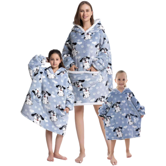 Adult and two children wearing happy dog blue oversized wearable hoodies