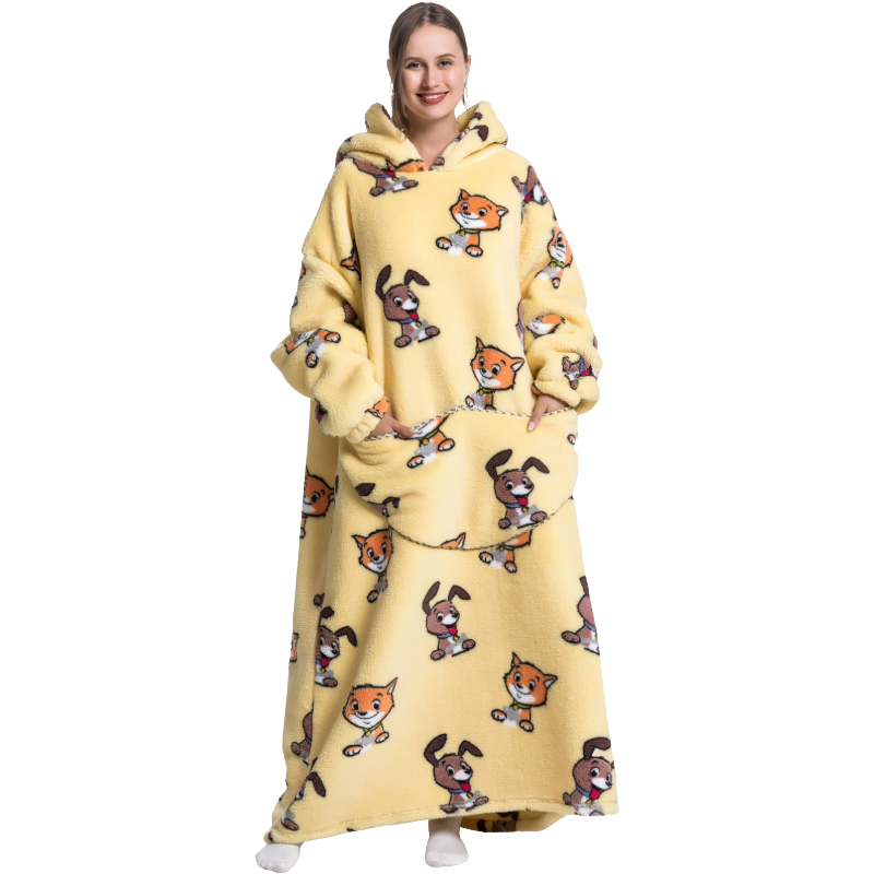 Person wearing a yellow hoodie with cartoon fox designs on a white background