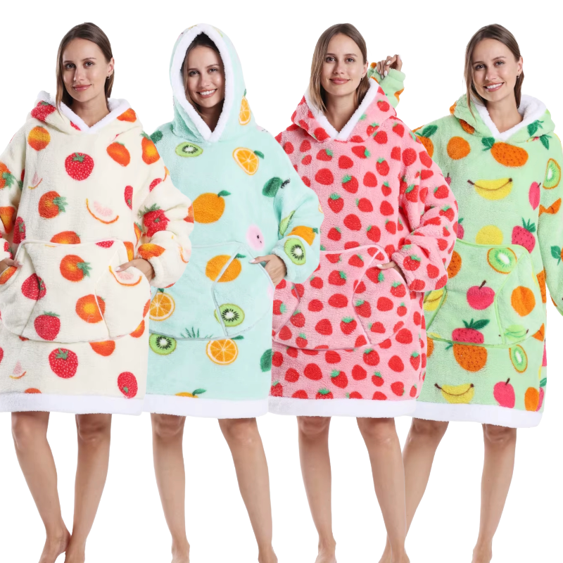 Oversized hooded fleece blanket hoodie showing assorted fruit print designs
