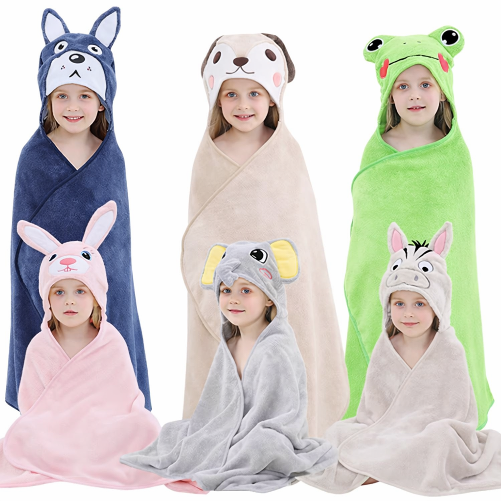 Child wrapped in a hooded animal-themed bath towel showing soft fabric and playful character hood design