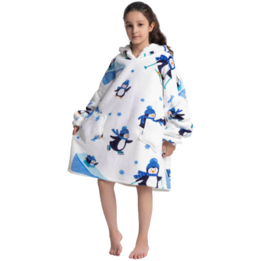 Child wearing a white penguin oversized wearable hoodie on a white background.