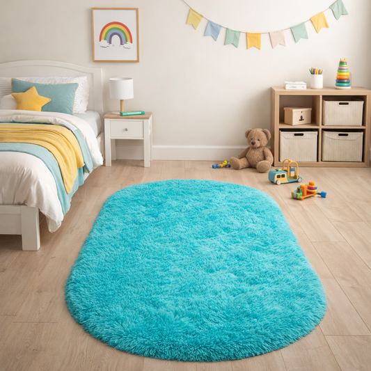 Bright aqua blue silky plush oval rug shown beside a bed in a bright children's bedroom