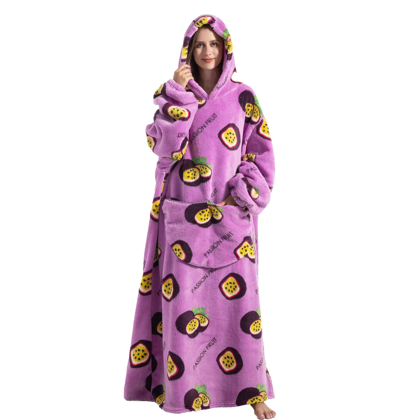 Person wearing a purple hoodie with fruit patterns on a white background
